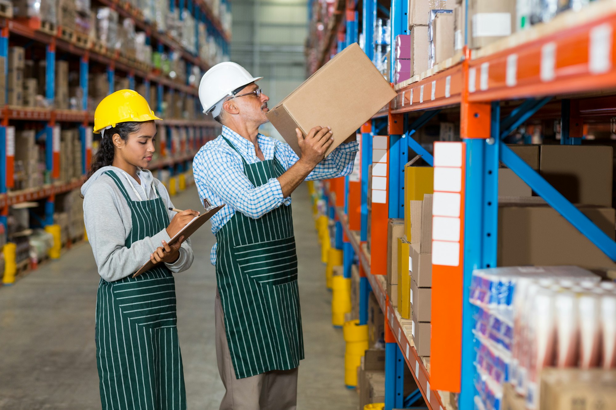 Warehouse workers checking the inventory